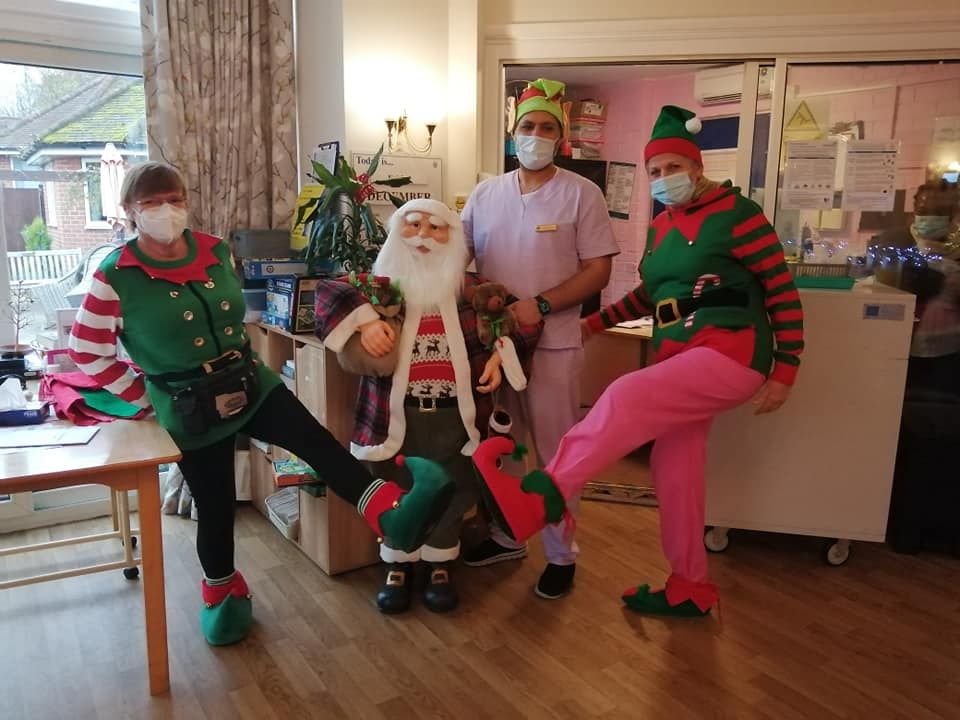 Care Workers celebrating Christmas with Father Christmas