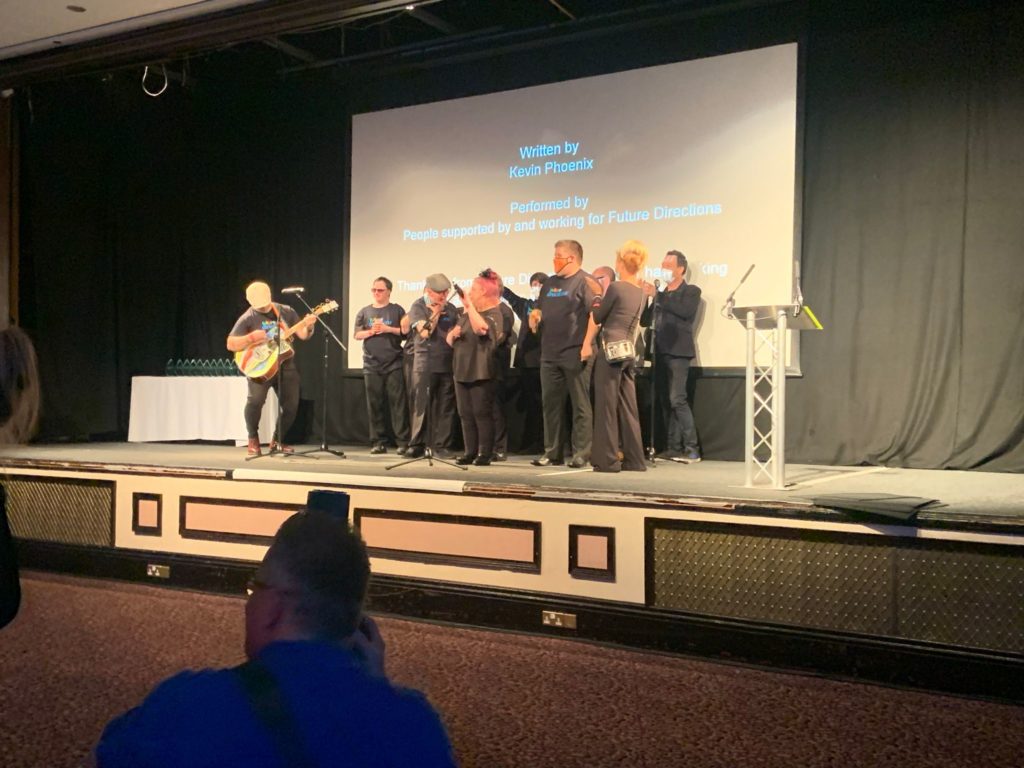 Stronger together performing on stage at the Leader in Care Awards 
