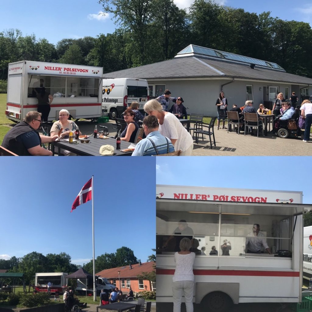 image shows a hot dog stand visiting a care home